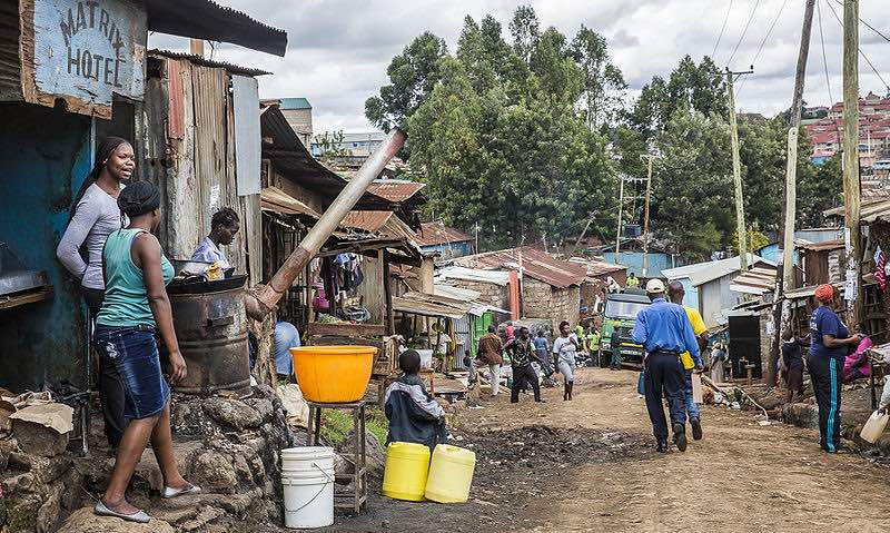  Kibera slum Nairobi Kenya, garbage truck